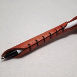 Feather quill pen wrap